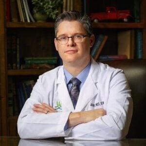 Dr. Jason West